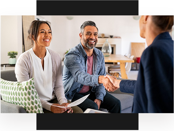 Multiethnic-happy-couple-handshake-with-consultant-at-home